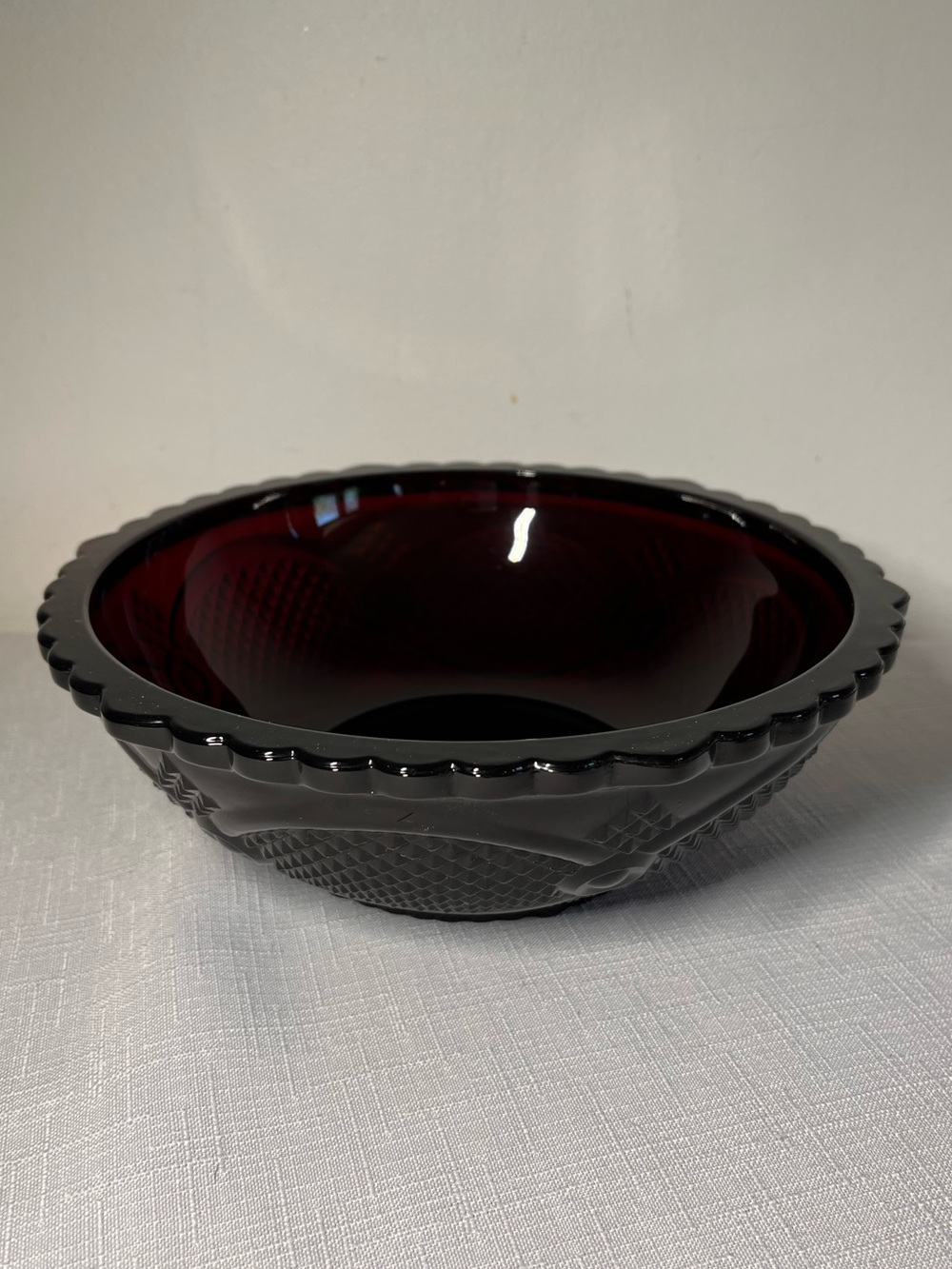 Avon 1876 Cape Cod Collection ruby red glass bowl textured pattern scalloped rim